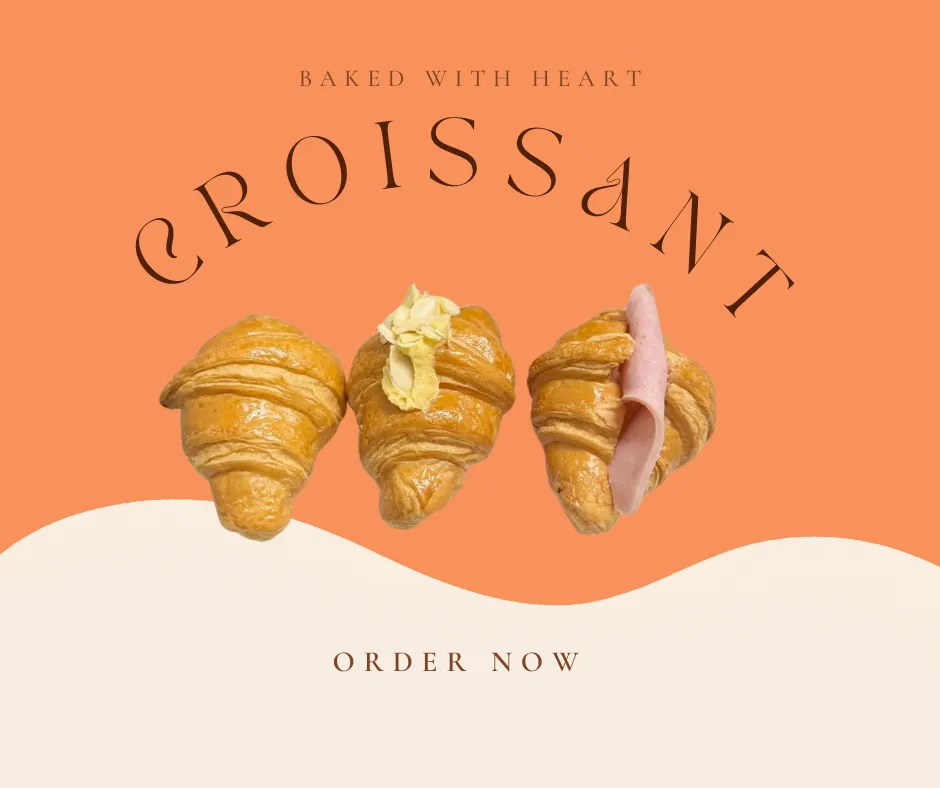 Ham and almond baked croissant close-up